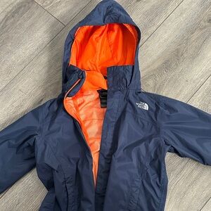 The North Face Kids Navy Jacket with Orange Lining Hood